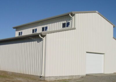 Large PEMB White Metal Barn with Roll Up Door